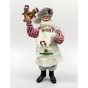 Baker Santa In Red Striped Shirt And Red Pants Holding Gingerbread Men {Q}